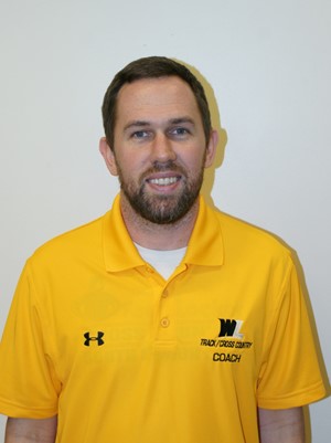 Justin Simpson, the Head Cross Country and Track Coach.