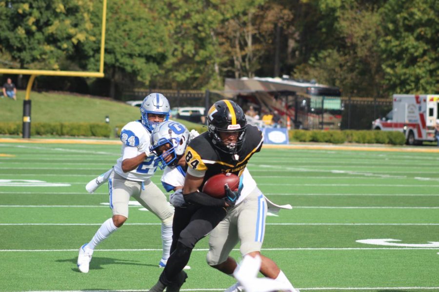 Isaiah Robinson breaks a tackle in the Hilltoppers win against Glenville State.