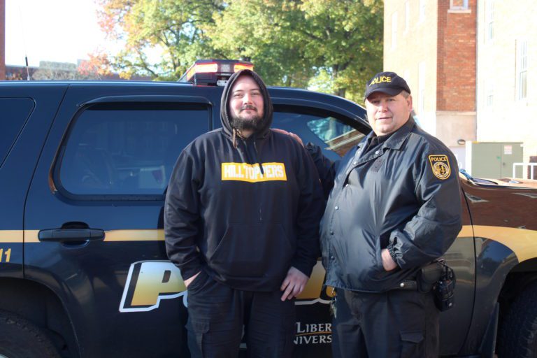Senior Criminal Justice major Wyatt Gardner and Officer J.R. Olejasz make a formidable team on the Hilltop campus.
