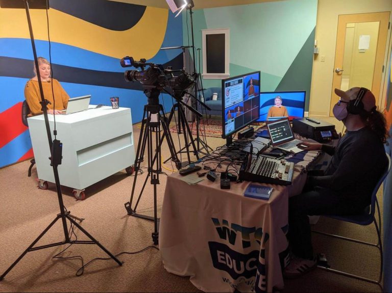 Alumnus Corey Knollinger (ballcap) is shown here producing a segment of award-winning educational content for “Raise Your Hand.”