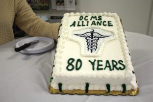 A cake celebrating the OCMSAs 80-year anniversary
