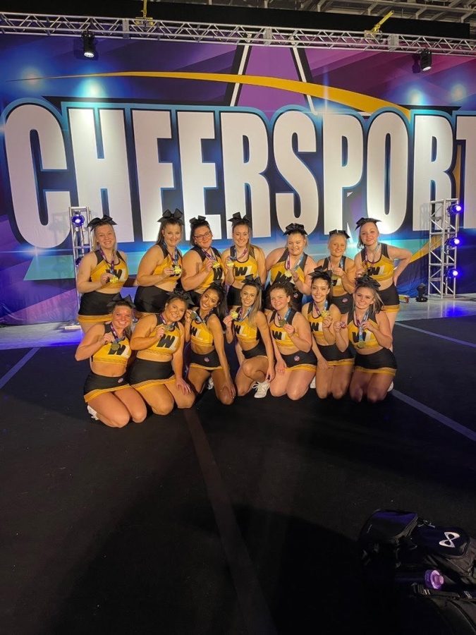 WLU cheer at a Cheersport event.