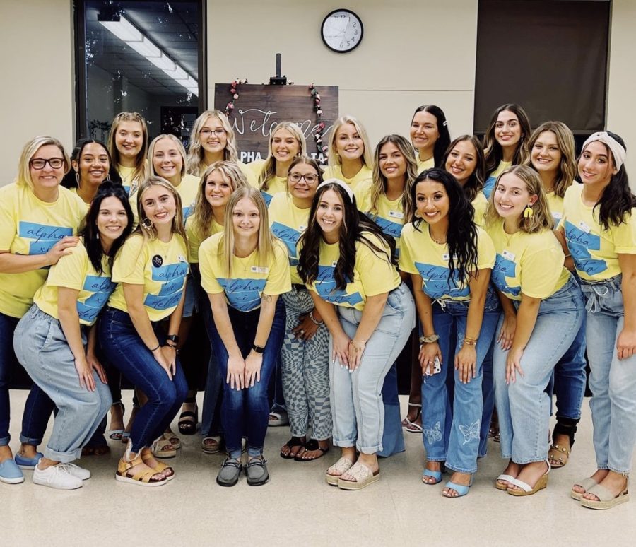 Alpha Xi Delta gathered inside their room during the first night of formal recruitment.