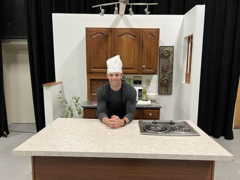 Sophomore James Salvatori on the set for the show in the Fine Arts building TV Production Room.
