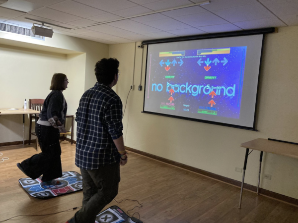 Alania Cole and Matthew Shuttleworth playing DDR with each other