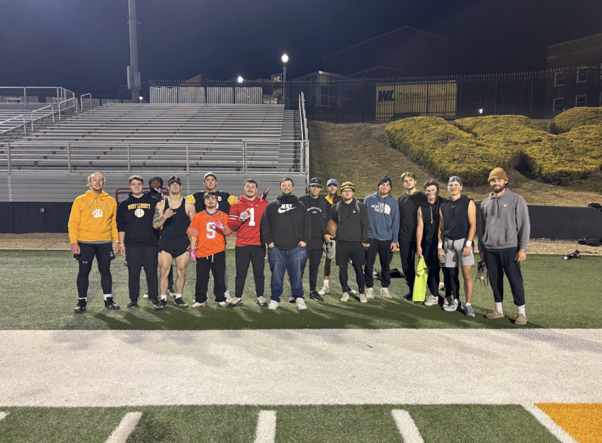 The WLU Intramurals Flag Football teams pose together for a group photo.